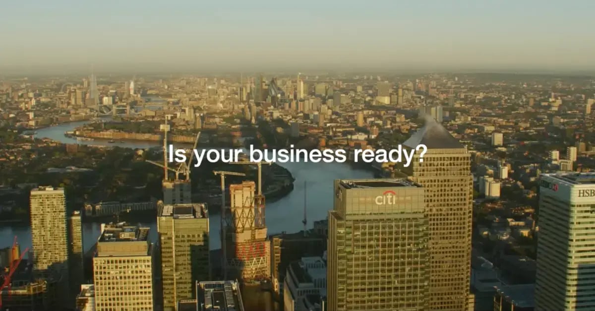 A city skyline with the words 'is your business ready?' in the foreground